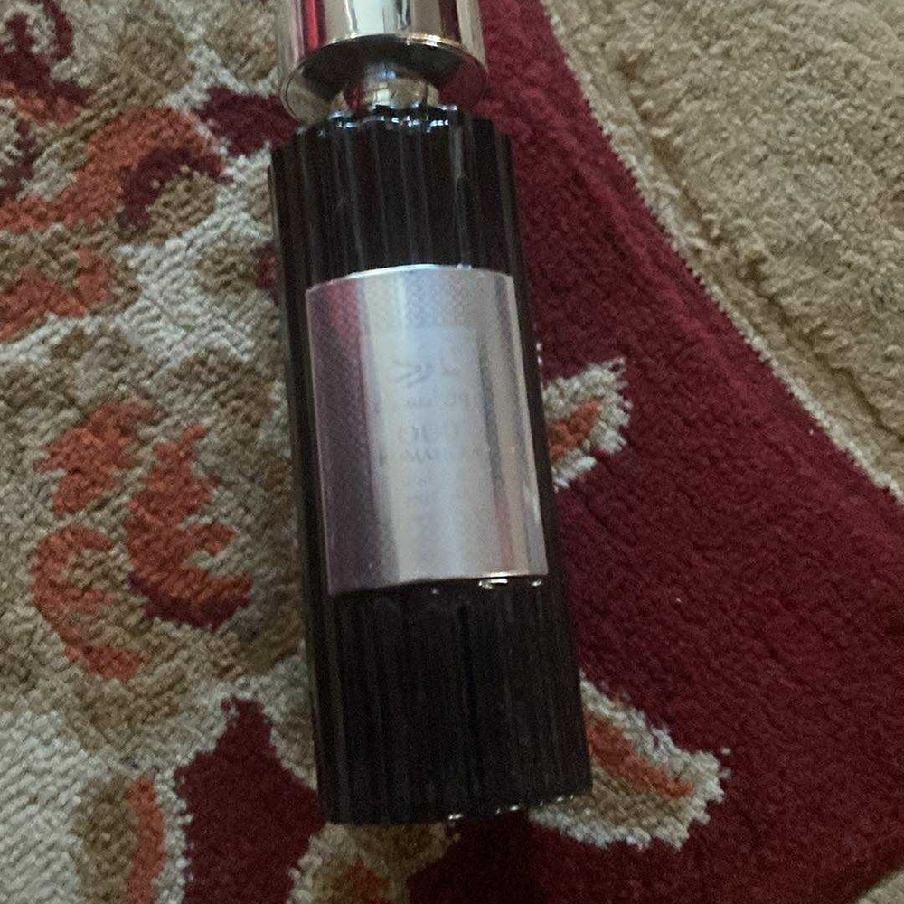 Nike Black and Silver Bottle
